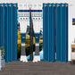 Blue curtains with white geometric pattern in a living room setting