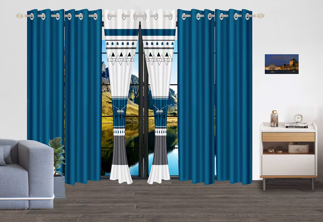 Blue curtains with white geometric pattern in a living room setting
