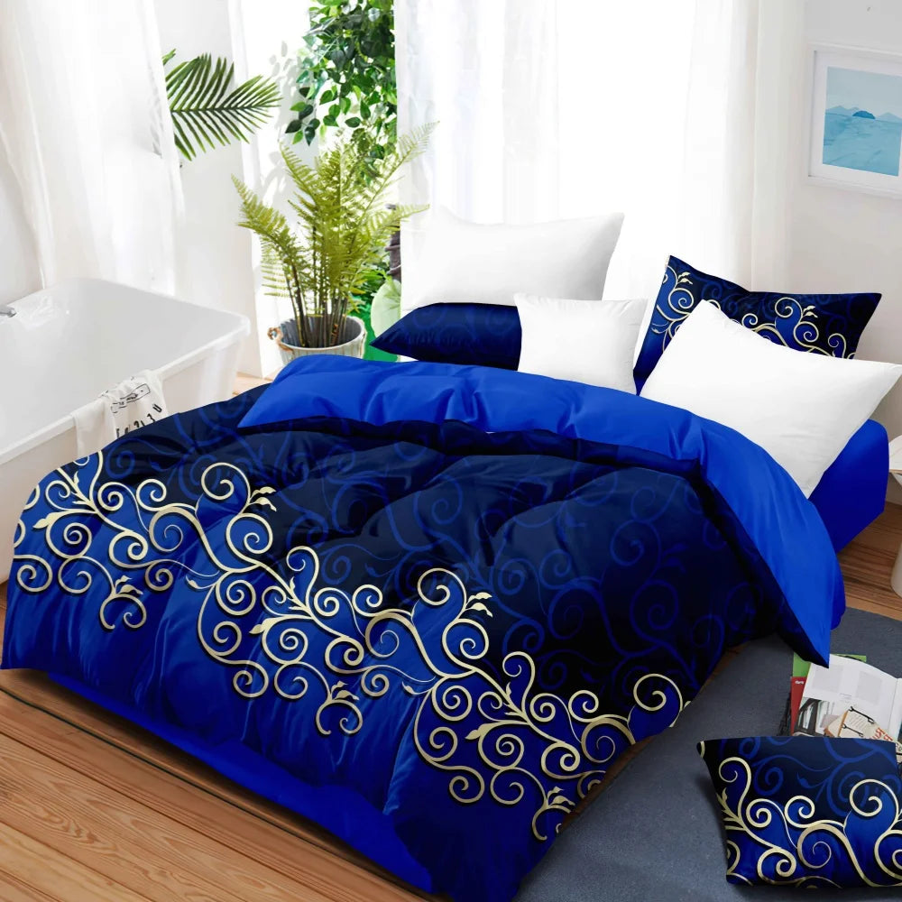 Blue bedspread with gold patterns on a bed in a bright room.