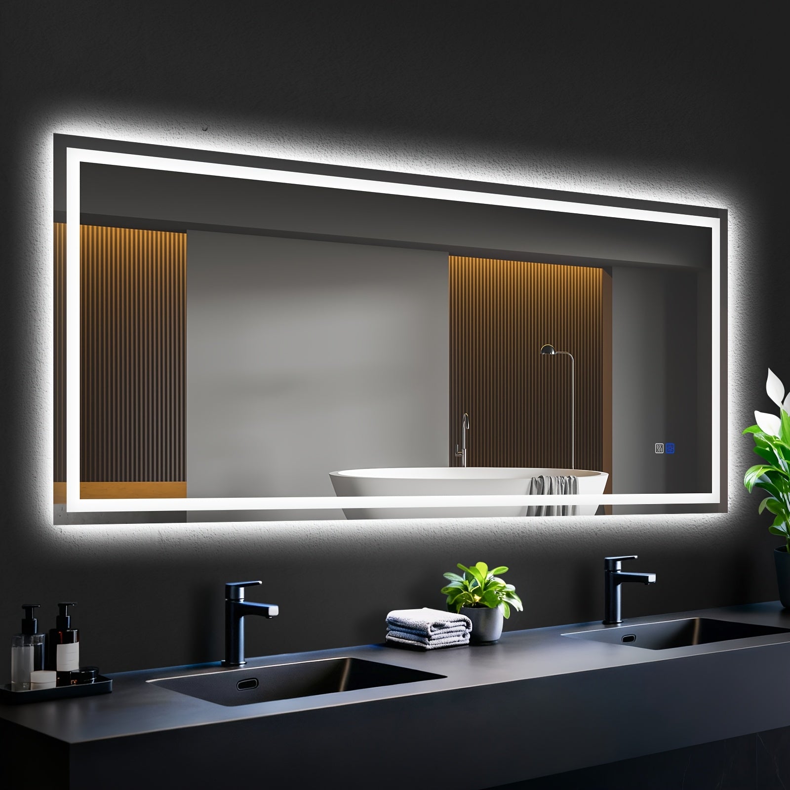 Bathroom with a large illuminated mirror above a sink