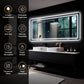 Bathroom vanity with a large illuminated mirror featuring various functionalities.