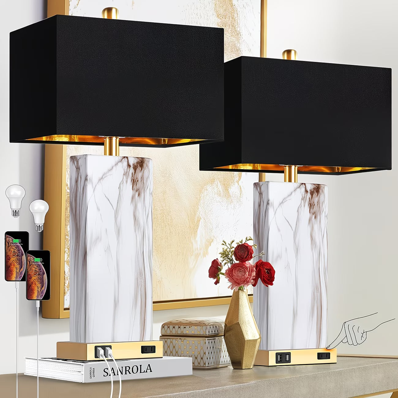 Two decorative lamps with black lampshades on a shelf with books and a vase.