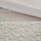 Close-up of textured white fabric with a subtle pattern