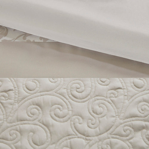 Close-up of textured white fabric with a subtle pattern