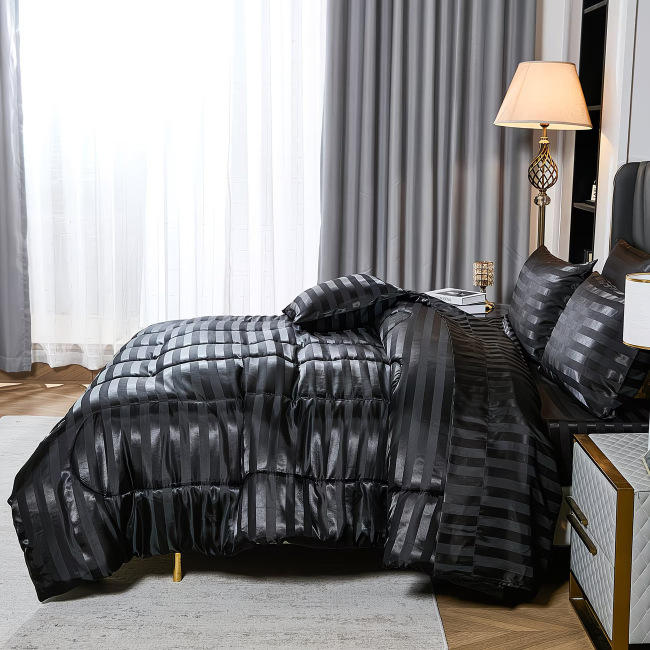 Black striped bedding set on a bed in a bedroom with curtains and a lamp.