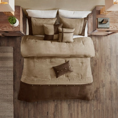 Brown bedding set on a bed with wooden headboard and nightstands.