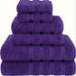 Stack of purple towels on a white background