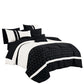 Black and white bedding set with geometric patterns on a white background