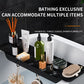 Bathing exclusive tray with various bathroom items on a black tray against a black tiled wall.