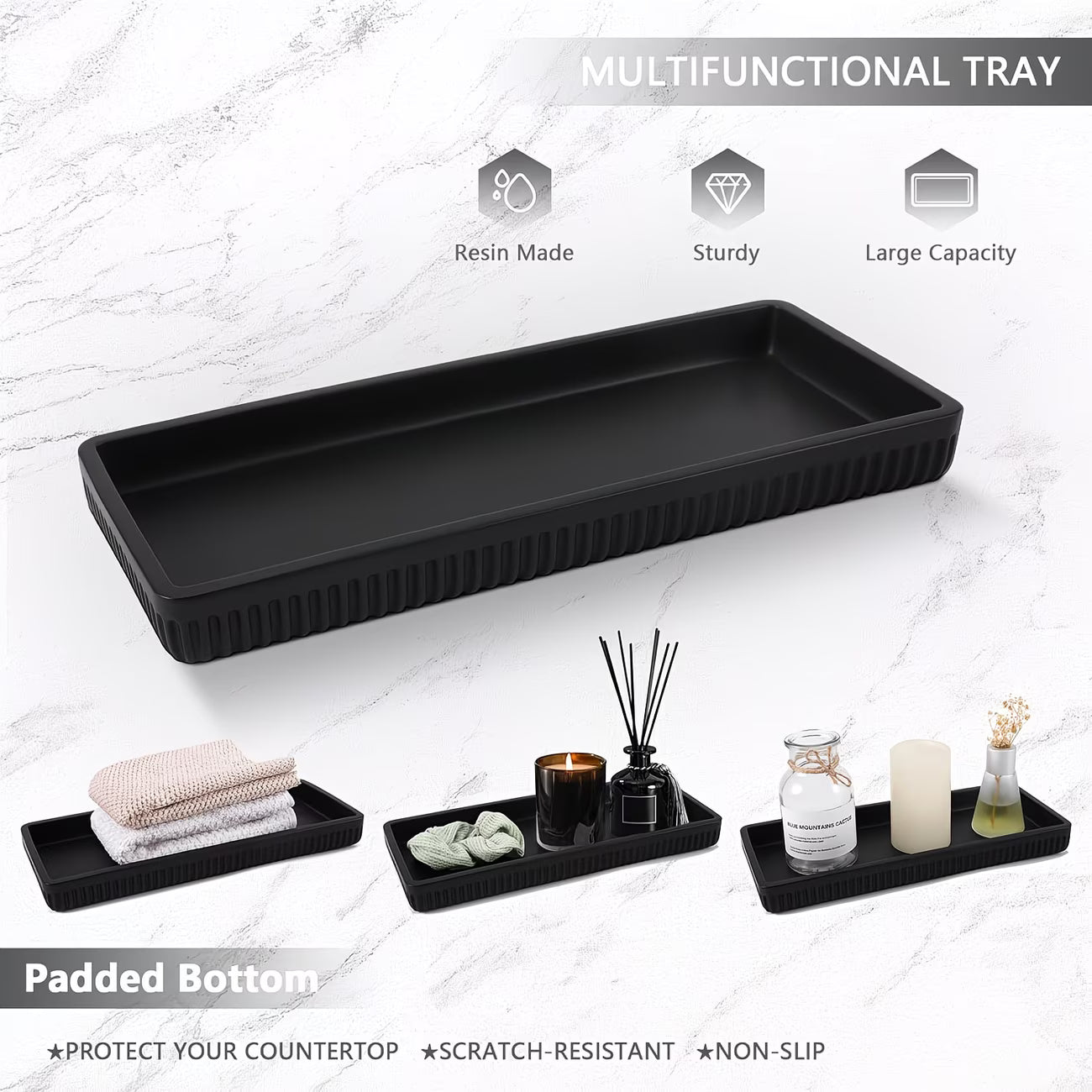 Black multifunctional tray with various items on a white surface