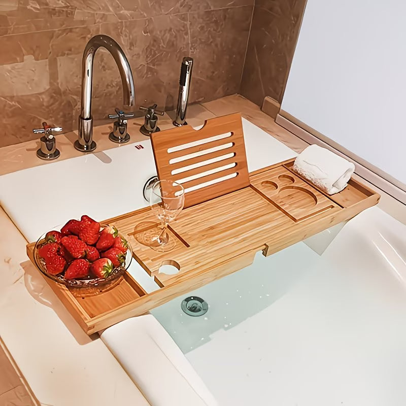 Bath tray with strawberries and a glass in a bathtub