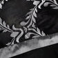 Black fabric with silver floral embroidery