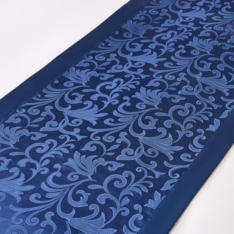 Blue patterned fabric on a white background