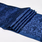 Blue patterned fabric on a white background