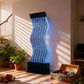 Wavy water feature in a room with toys and plants