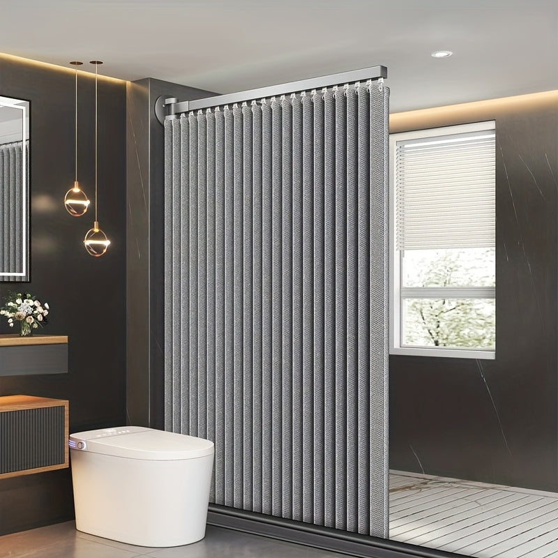 Modern bathroom with a vertical radiator and a window.