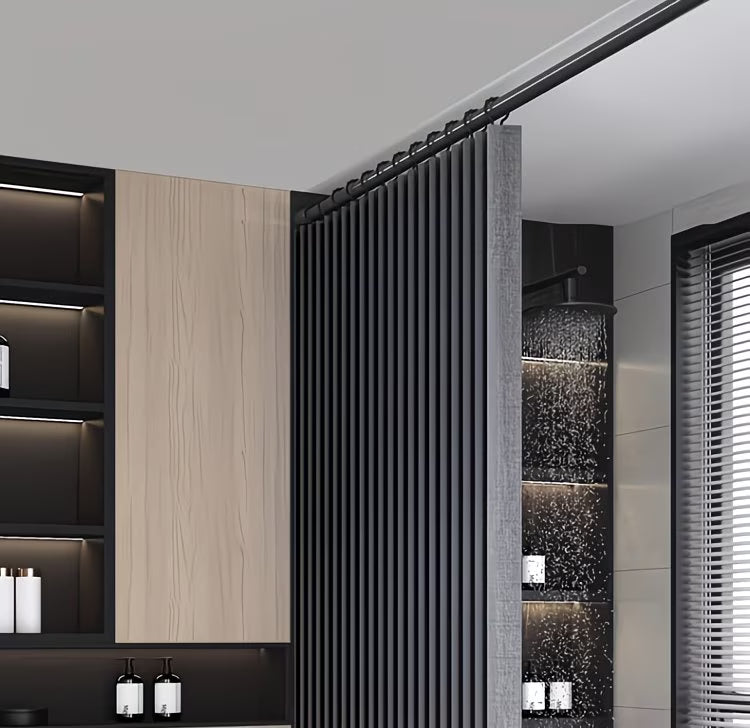 Modern bathroom interior with shower area, cabinets, and lighting fixtures.