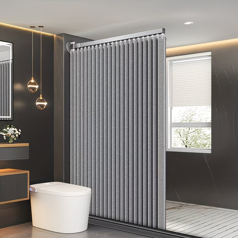 Modern bathroom with a vertical radiator and a window.