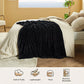 Black knitted blanket on a bed with room decor, featuring icons for softness, lightness, thickness, and machine washability.