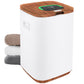 White laundry basket with wooden top and sides, featuring a digital display, next to folded towels on a white background.