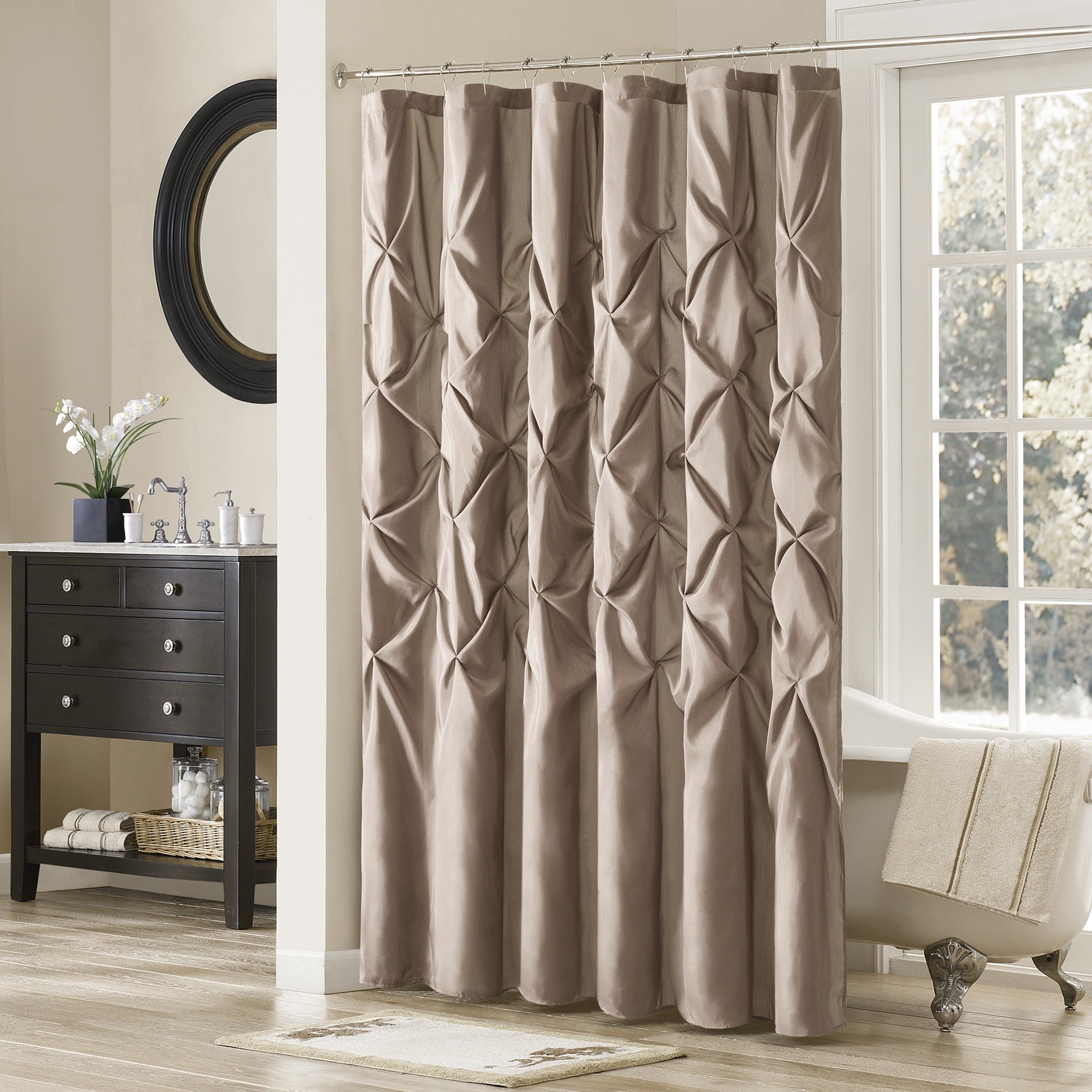 Brown textured shower curtain in a bathroom setting with a window and vanity.