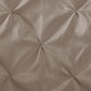 Beige quilted fabric texture