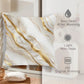 Decorative pillow with gold abstract pattern on a neutral background