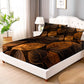 Bed with brown leaf patterned comforter in a bedroom setting