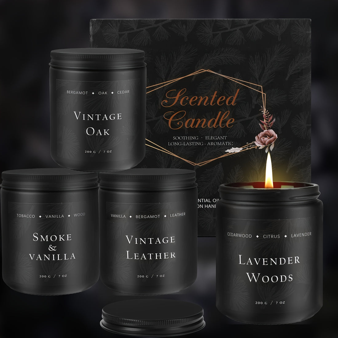 Collection of black candles with labels and a lit candle on a dark background