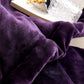 Close-up of a purple textured fabric with a blurred background