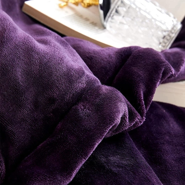 Close-up of a purple textured fabric with a blurred background