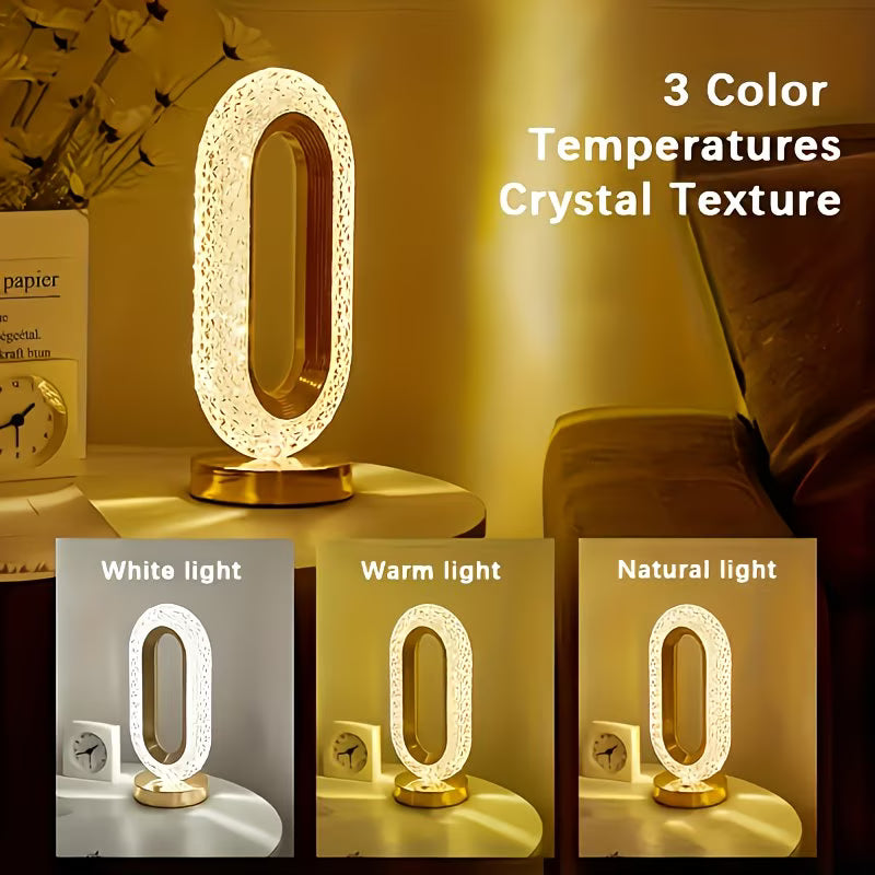 Decorative lamp with crystal texture showing three color temperatures on a table.