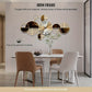 Decorative wall clock with iron frame in a modern dining room setting