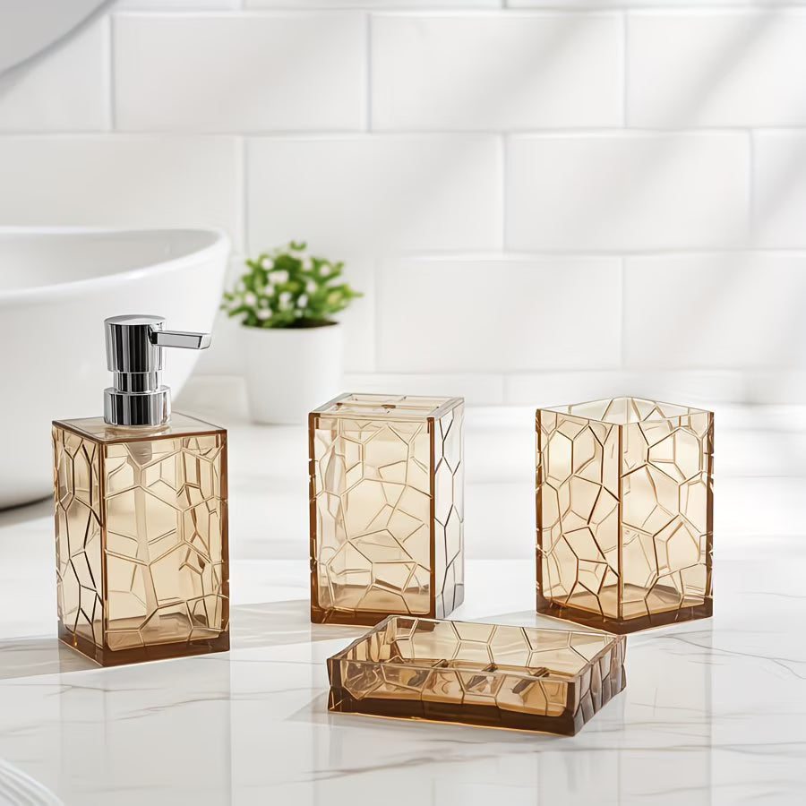Bathroom accessories set with glass containers and a soap dispenser on a white tiled wall background.