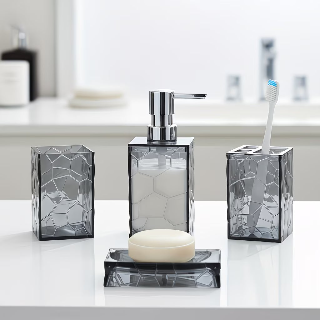 Bathroom accessories set with soap dispenser, toothbrush holder, and soap dish on a white surface.