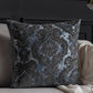 Decorative pillow with intricate pattern on a couch