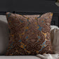 Decorative pillow with intricate pattern on a sofa