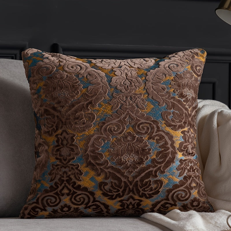 Decorative pillow with intricate pattern on a sofa