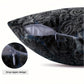 Dark textured pillow with a drop zipper design on a white background