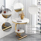 Modern side table with marble top and gold base in a stylish interior setting.
