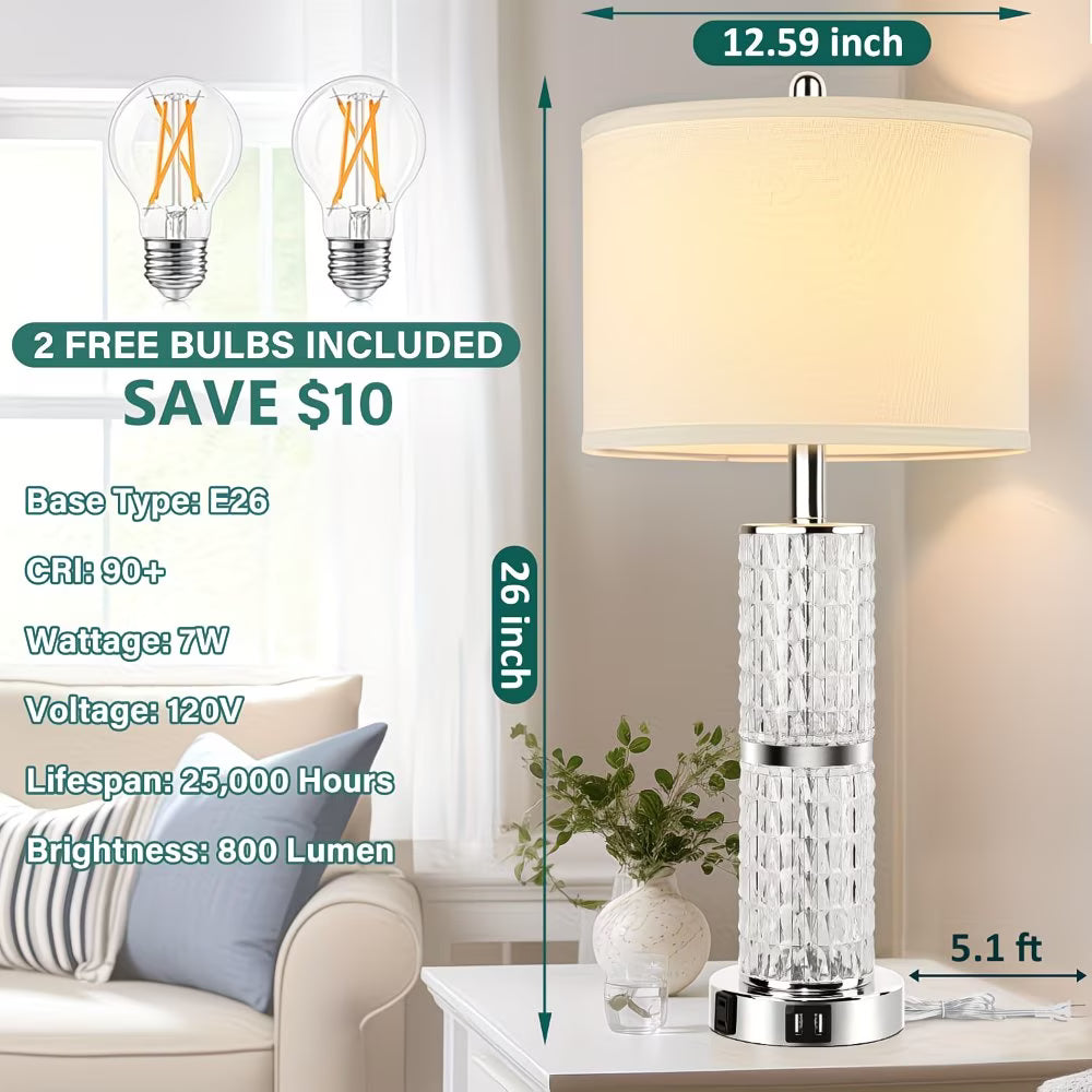 Table lamp with crystal base on a table next to a couch, with measurements and bulb information displayed.