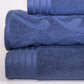 Stack of blue towels on a light gray background