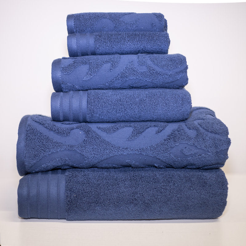 Stack of blue towels on a white background