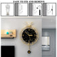 Decorative wall clock with gold frame and black marble face on a wall, with installation instructions above.