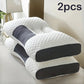 Two white and black ergonomic pillows on a light surface with '2pcs' text above.