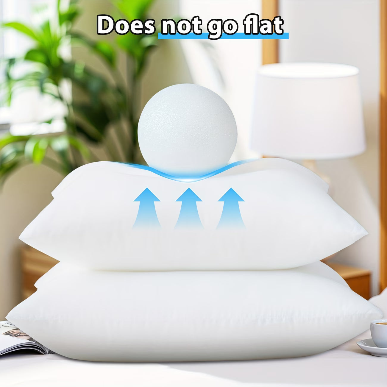 White pillow with text 'Does not go flat' and arrows indicating support.