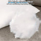 White pillow with 7D high elastic fiber on a gray surface