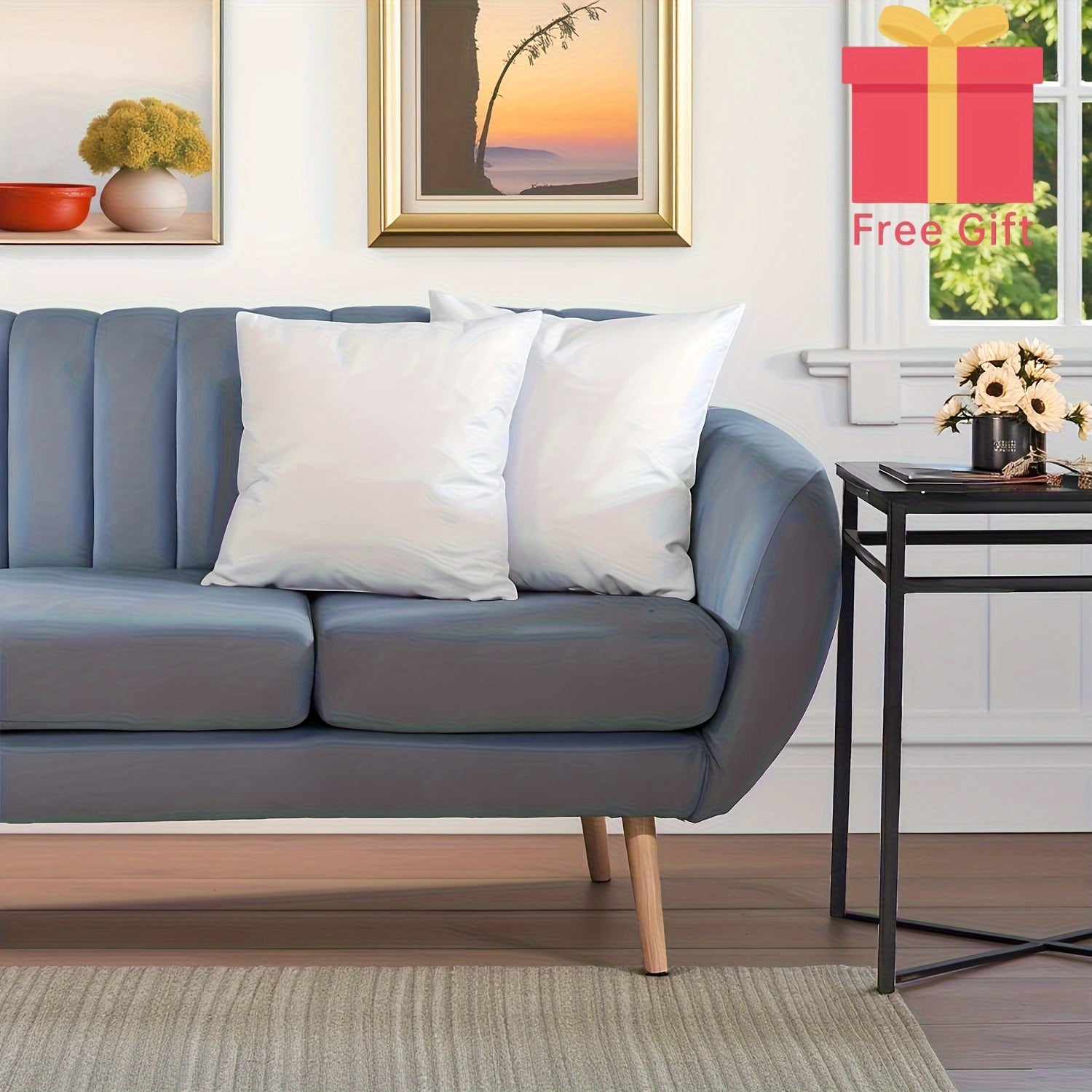 Gray sofa with white pillows in a living room setting, featuring a free gift offer.