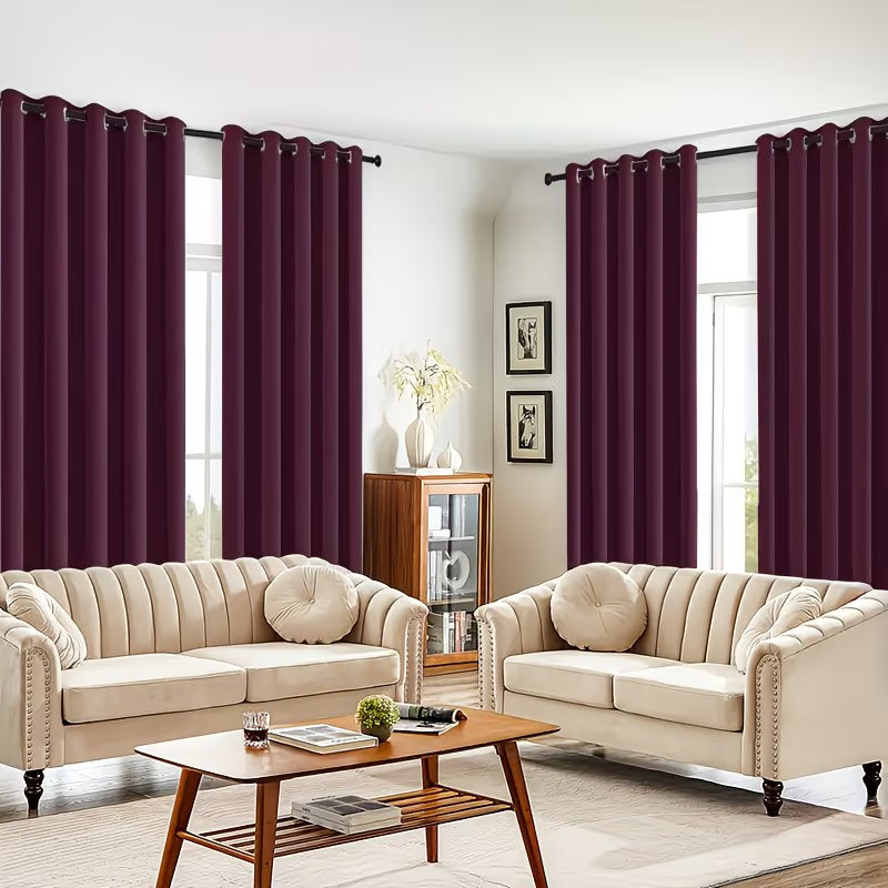 Living room with beige sofas, a wooden coffee table, and purple curtains.