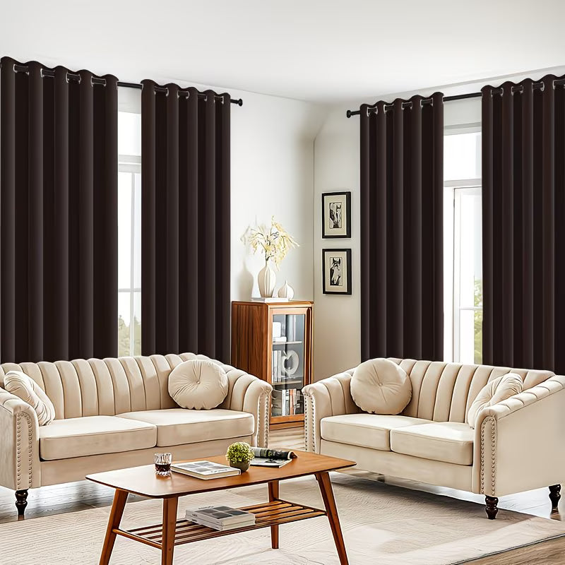 Living room with beige sofas, a wooden coffee table, and dark curtains.